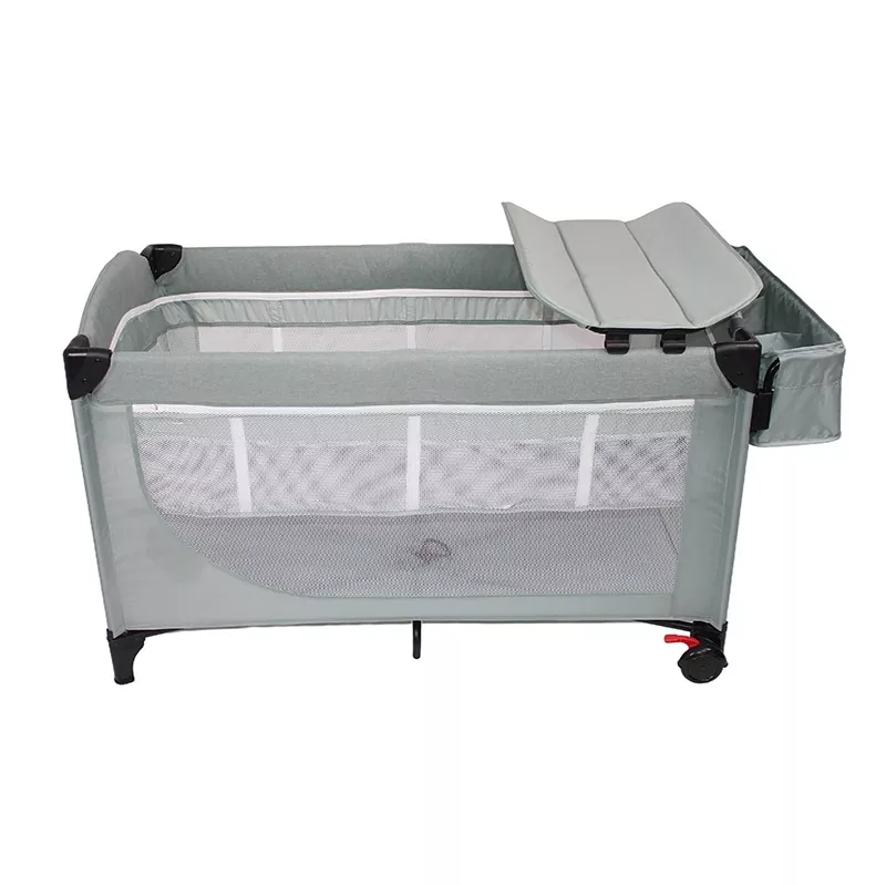 Lit de bébé mobile et épissé avec table à couches